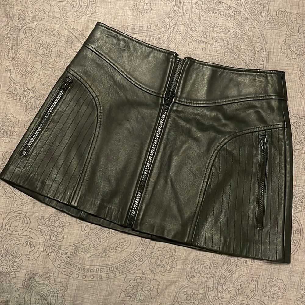 Cool leather mini skirt.